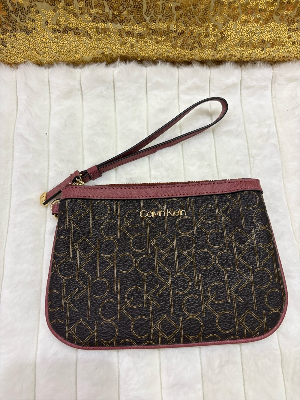 Calvin Klein Brown Logo Wristlet with Mauve Trim and Strap